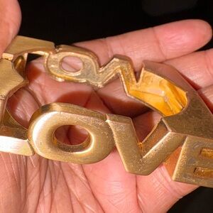 LOVE Statement Bangle Bracelet in Brass Tone